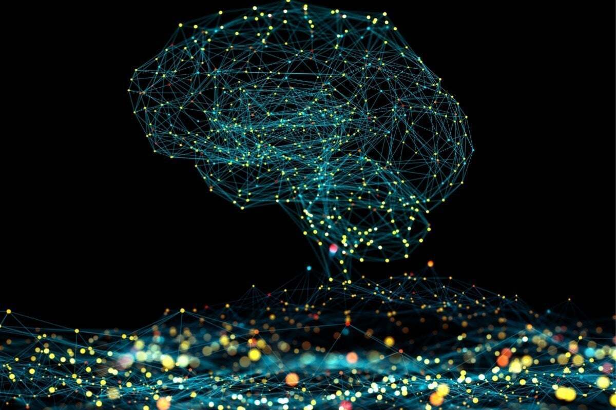 Illuminated network diagram in the shape of a brain